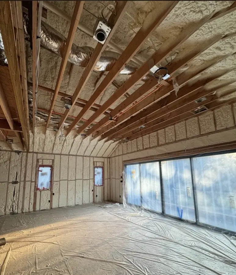 Interior walls and ceiling insulated with spray foam during new construction in Port Townsend
